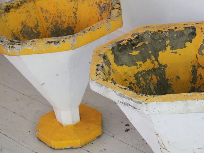 A pair of supercool white and yellow 50's planters