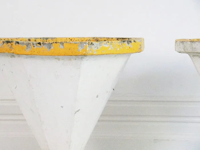 A pair of supercool white and yellow 50's planters