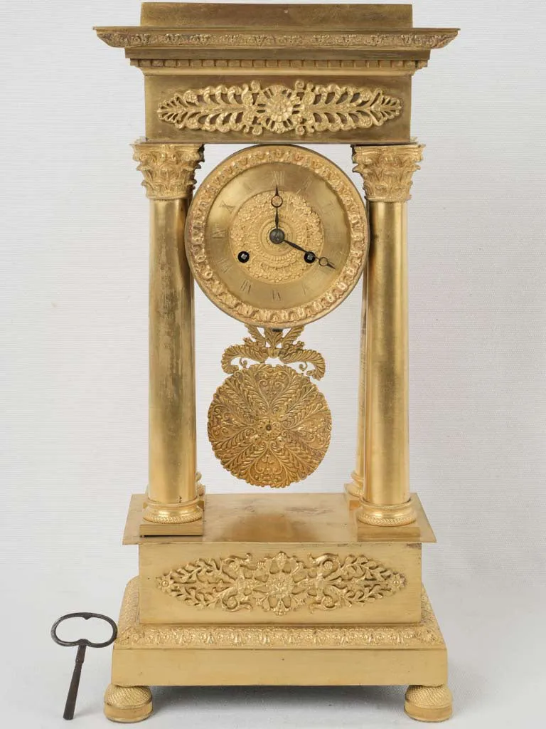 Empire period portico clock - ormolu 17¾"