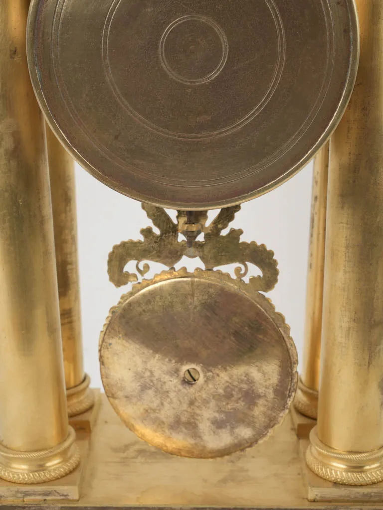 Empire period portico clock - ormolu 17¾"