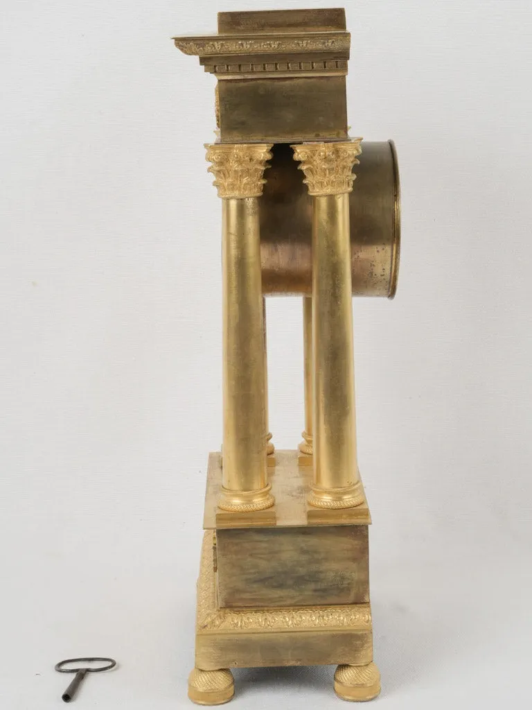 Empire period portico clock - ormolu 17¾"