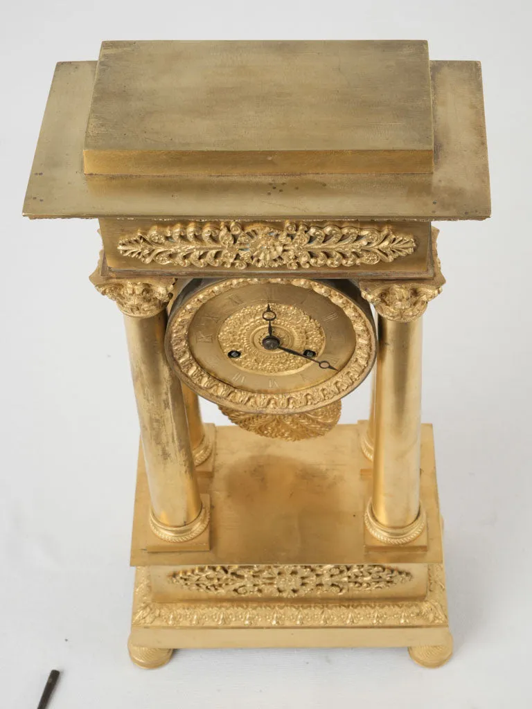 Empire period portico clock - ormolu 17¾"