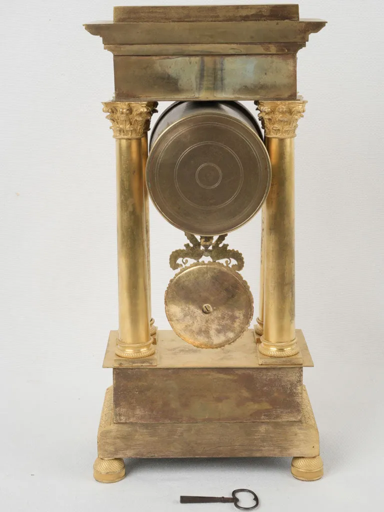 Empire period portico clock - ormolu 17¾"