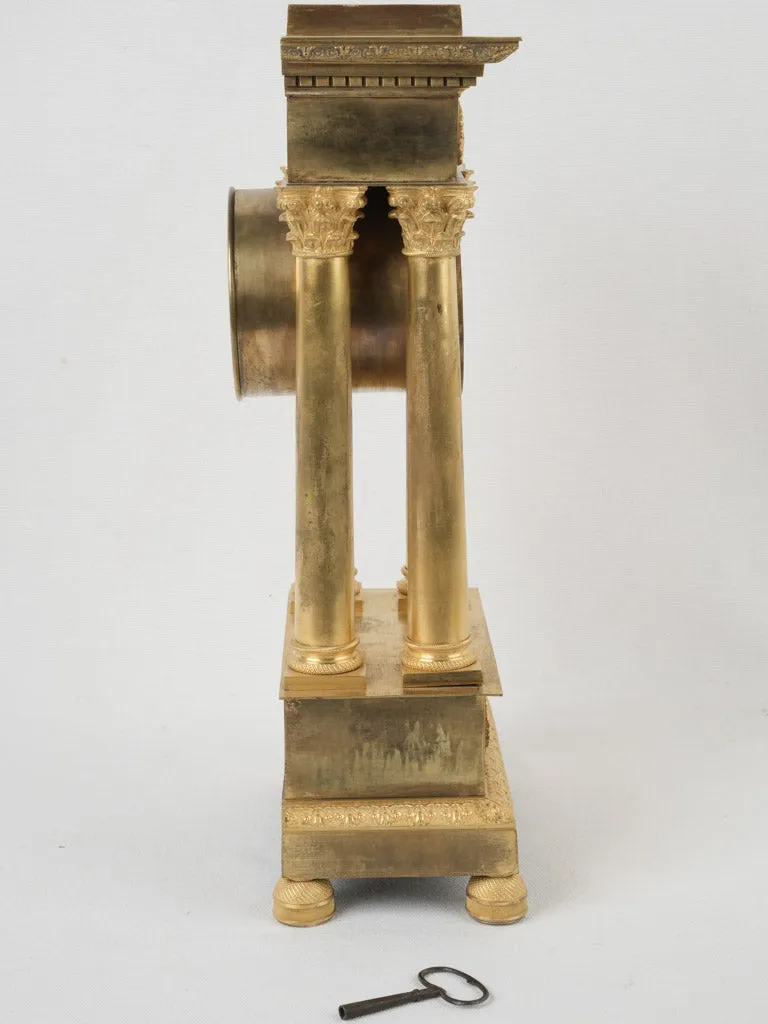 Empire period portico clock - ormolu 17¾"